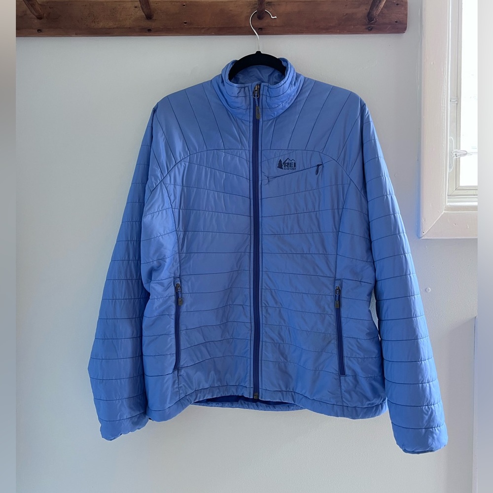 REI women’s full zip puffer jacket. Light weight. Blue. Size XL.